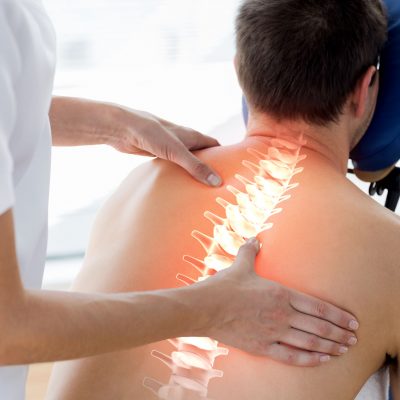 42112810 - digital composite of highlighted spine of man at physiotherapy